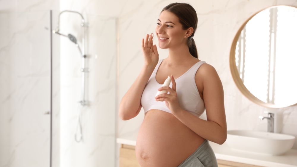 Pregnant Woman Touching Face Or Skin - symmetrica Blog